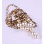 A 14ct gold and pearl pendant, formed as a bunch of grapes, on 9ct gold fine link chain