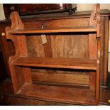 A pine three-tier wall shelf, 23" wide, and a three-tier book trough