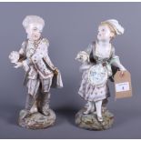 A pair of Continental porcelain figures of a boy and girl in 18th century attire, 12" high