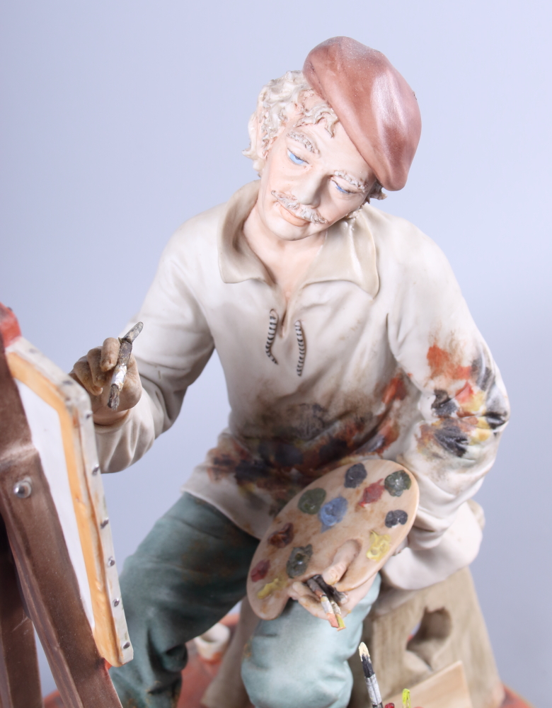 A Continental porcelain figure of an artist seated at his easel - Image 2 of 2