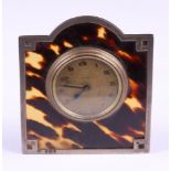 A silver mounted tortoiseshell strut clock with eight-day movement