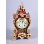 A late 19th century French mantel clock, in Boulle decorated case with gilt metal mounts, 14" high
