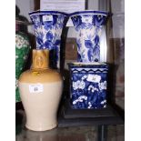 A pair of blue and white octagonal waisted vases, 15" high, a smaller, similar square planter and