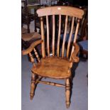 A Windsor lath back kitchen armchair