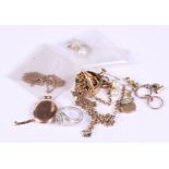 A selection of gold and other jewellery including a 9ct gold textured ring, a gold locket, earrings,