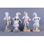 A pair of 19th century Berlin porcelain figures, children in early 19th century attire, 11" high,