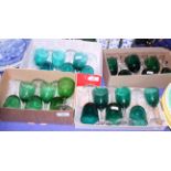 Four sets of six matched 19th century green glass wines