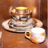 A Satsuma miniature cabinet cup and saucer with millefiori decoration, a figure decorated trio and