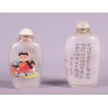 A Chinese reverse painted glass snuff bottle with figures and verse, 3" high, a smaller similar