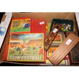 A Peter Pan "Blow Football" game, a 1930's tiddlywinks set, two cribbage boards and a number of