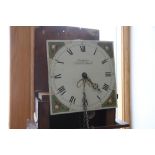 An early 19th century oak and mahogany banded long case clock with thirty hour movement by