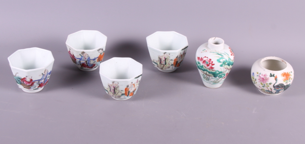 Four 19th century Chinese porcelain famille vert octagonal bowls decorated figures and two similar