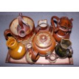 A collection of 19th century brown two-tone glazed ceramics (damages)