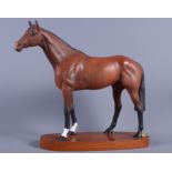 A Beswick racehorse, on hardwood base, 12" high