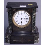 A Victorian mantel clock, in black slate and green marble case, 9 1/2" high