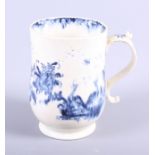 An 18th century English porcelain tankard with blue and white painted decoration, inscribed on the