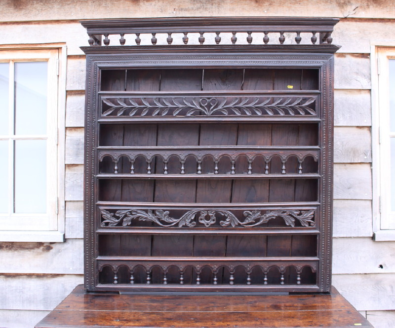 A 19th century Breton carved oak dresser, the upper section fitted four plate racks over two drawers - Image 2 of 4
