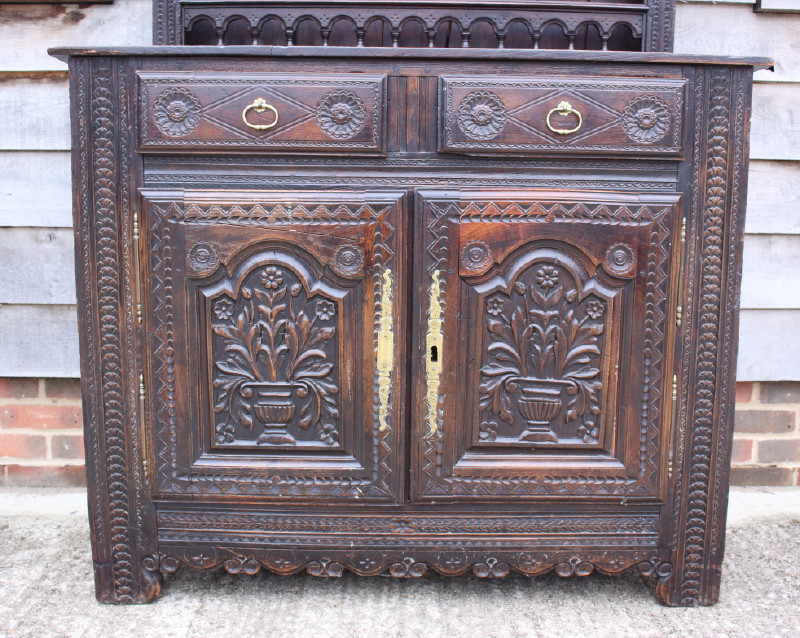 A 19th century Breton carved oak dresser, the upper section fitted four plate racks over two drawers - Image 3 of 4