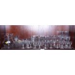 A set of eight cut glass champagnes, a set of ten cut glass goblets and other cut glass brandies,