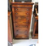 A 19th century rosewood Wellington chest, fitted seven drawers, 22" wide