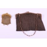 A Continental 18ct gold mesh evening purse, 29.1g, and a larger rolled gold mesh evening purse