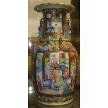A 19th century Chinese / Cantonese famille verte baluster shaped vase decorated two panels of