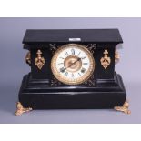 A late 19th century black slate and gilt mounted mantel clock with eight-day striking movement, 10