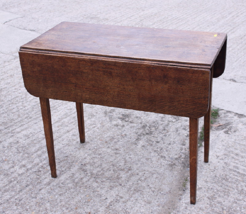 A late 19th century oak Pembroke table, 36" wide