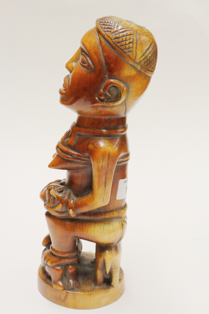 A West African carved ivory figure of a seated woman and child, 11 1/2" high - Image 2 of 6