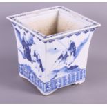 A Chinese blue and white square-section jardiniere decorated figures, 8" high, and a similar