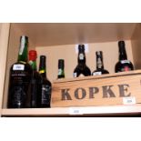 A bottle of Constantino vintage 1958 port, a bottle of Kopke 1981 late bottled vintage port, in