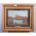 A pair of 19th century carved cork pictures, Conway Castle, in deep gilt frames, and a collage