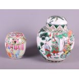 Four 19th century Cantonese enamelled concentric drum-shaped boxes and covers decorated figures, the
