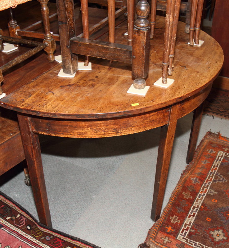 A 19th century mahogany bowfront side table, on square taper supports, 48" wide