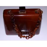 An Art Deco faux tortoiseshell evening bag, 6" wide