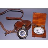 A WWI prismatic compass by John Wardale, in leather case, and another compass, in mahogany case