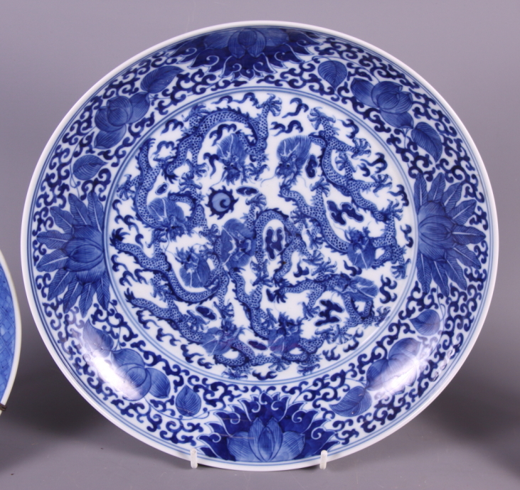 A pair of 19th century Chinese porcelain blue and white plates decorated floral motifs, a larger - Image 3 of 9