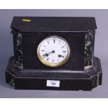 A 19th century French black slate and veined marble mantel clock with eight-day striking movement