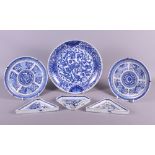 A pair of 19th century Chinese porcelain blue and white plates decorated floral motifs, a larger