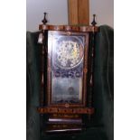 A 19th century "Caledonian registered" walnut and inlaid cased wall clock with eight-day striking