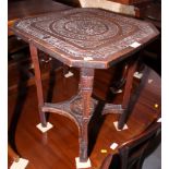 A hardwood carved two-tier occasional table, 18" square