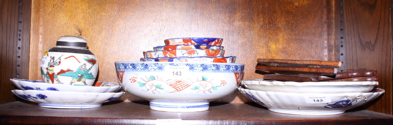 Three Imari bowls, two Imari plates, two lobed oval dishes and other Oriental ceramics