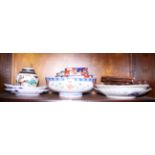 Three Imari bowls, two Imari plates, two lobed oval dishes and other Oriental ceramics