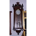 A Vienna style wall clock with white enamel dial, 36" high