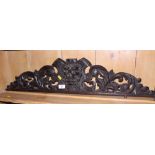 A 19th century carved oak cresting, the arms of Reading, 39" wide, a lion carved cresting, 38" wide,