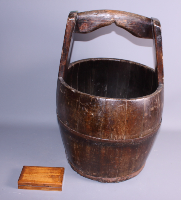 A Japanese coopered pine water bucket, 14" dia, and an olive wood stamp box, 5 1/2" wide