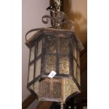 A wrought iron ceiling lantern and two two-light wall brackets, various