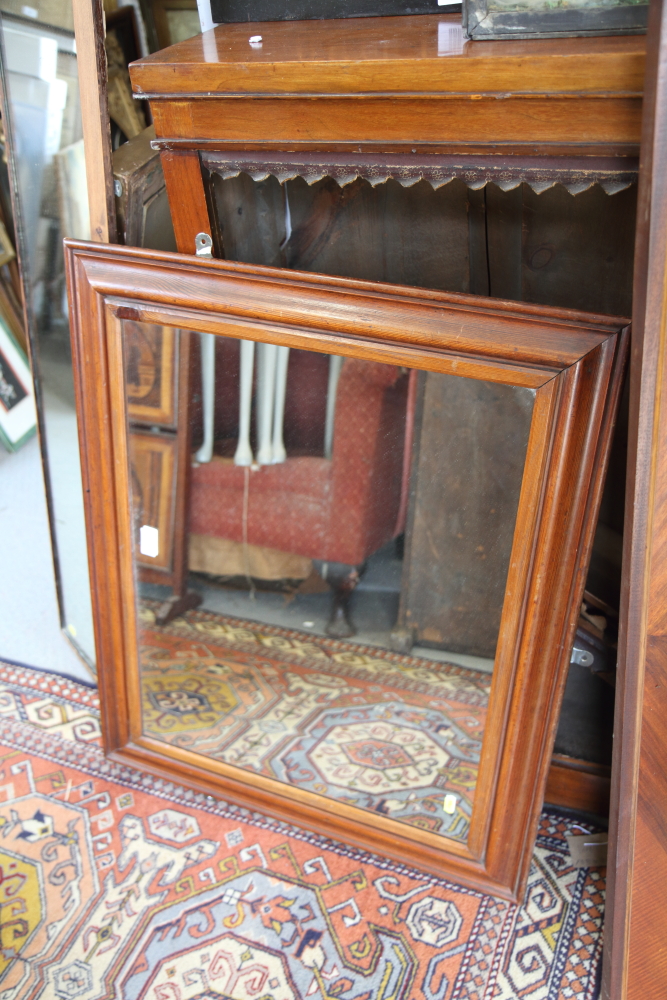 A waxed pine framed wall mirror, plate 19 1/2" x 25"