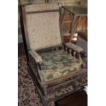 A 19th century American rocking chair, upholstered in a floral tapestry, and another American