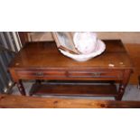 An Edwardian walnut dressing table, fitted two drawers and undertier, 45" wide